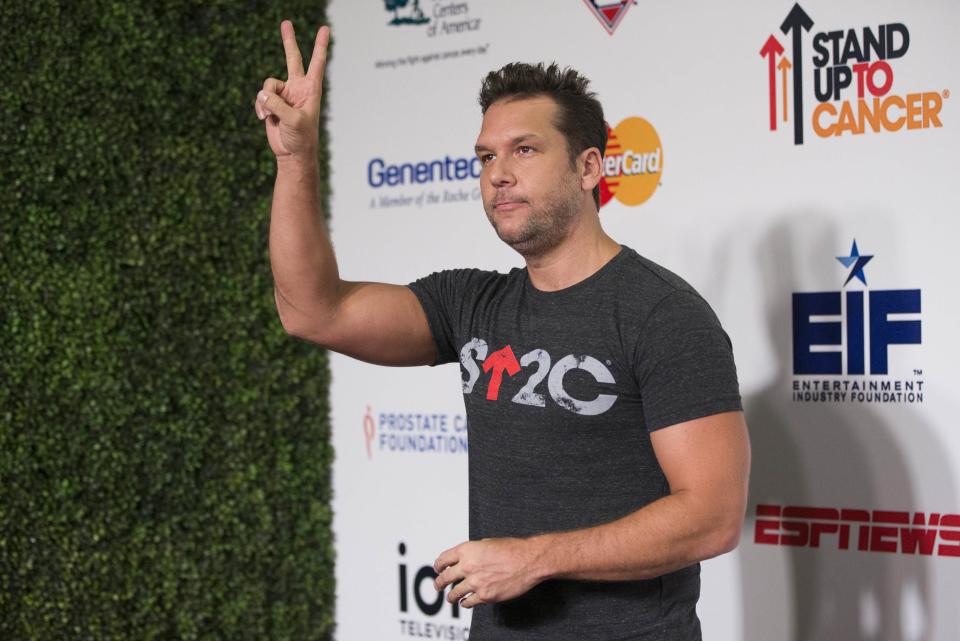 Actor and comedian Dane Cook poses as he arrives for the fourth biennial Stand Up To Cancer fundraising telecast in Hollywood, California September 5, 2014. REUTERS/Mario Anzuoni (UNITED STATES - Tags: ENTERTAINMENT)