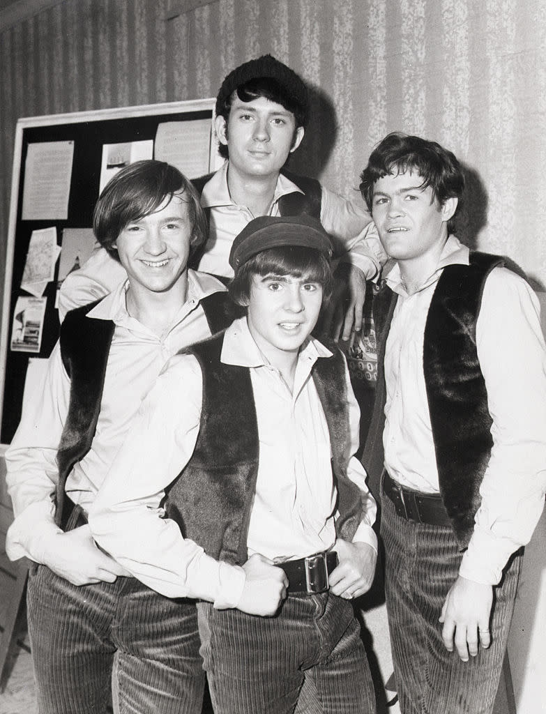 Mike Nesmith, top right, appears with, clockwise, Micky Dolenz, Davy Jones and Peter Tork, as part of The Monkees in 1965. (Photo: Bettmann/Getty Images)