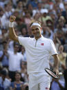 Switzerland's Roger Federer celebrates defeating Japan's Kei Nishikori during a men's quarterfinal match on day nine of the Wimbledon Tennis Championships in London, Wednesday, July 10, 2019. (AP Photo/Tim Ireland)