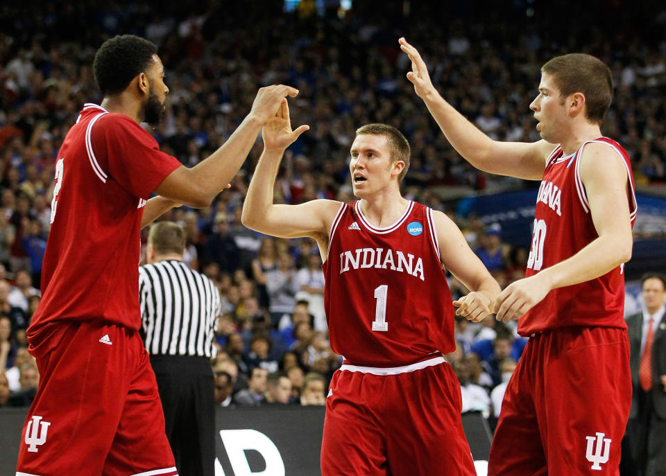 ATLANTA, GA - MARCH 23: Christian Watford #2, Jordan Hulls #1 and Matt Roth #30 of the Indiana Hoosiers celebrate in the first half against the Kentucky Wildcats during the 2012 NCAA Men's Basketball South Regional Semifinal game at the Georgia Dome on March 23, 2012 in Atlanta, Georgia. (Photo by Kevin C. Cox/Getty Images)