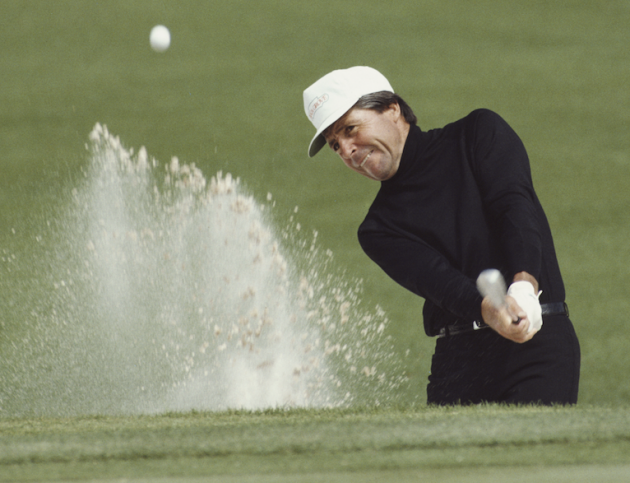 Gary Player hits a bunker shot