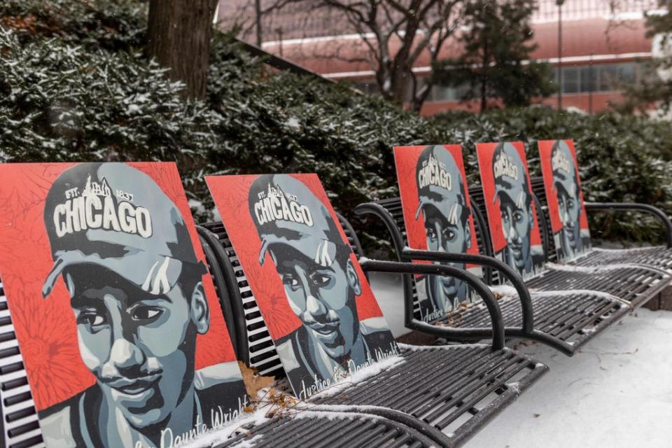 Pictures of Daunte Wright are left on benches outside the Hennepin County Government Center in Minneapolis, Minnesota, on 21 December as the jury deliberates (AFP via Getty Images)