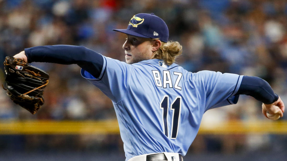 Tampa Bay Rays' Kevin Kiermaier puts on his sunglasses before a