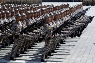 Soldiers march past during a parade for the 70th anniversary of North Korea's founding day in Pyongyang, North Korea, Sunday, Sept. 9, 2018. North Korea staged a major military parade, huge rallies and will revive its iconic mass games on Sunday to mark its 70th anniversary as a nation. (AP Photo/Ng Han Guan)