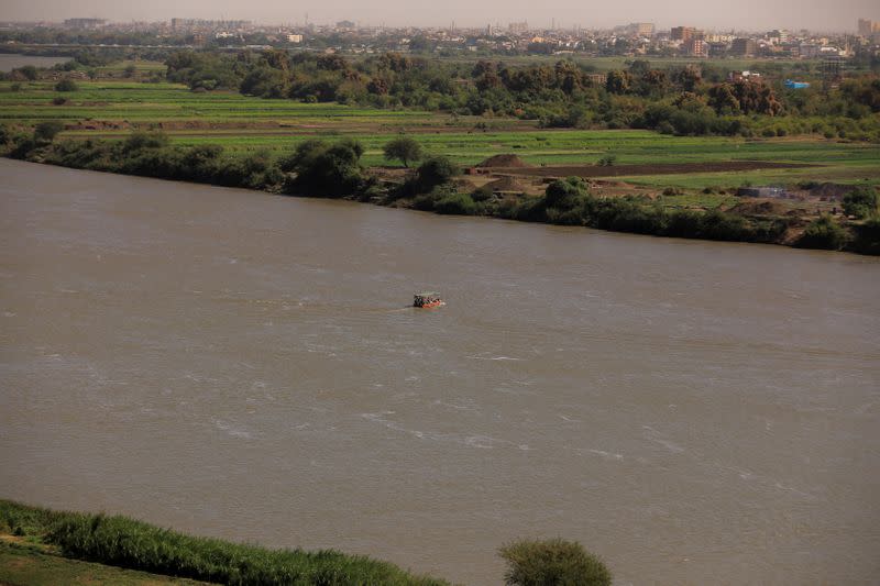 The Wider Image: Fears at Nile's convergence in Sudan that new dam will sap river's strength