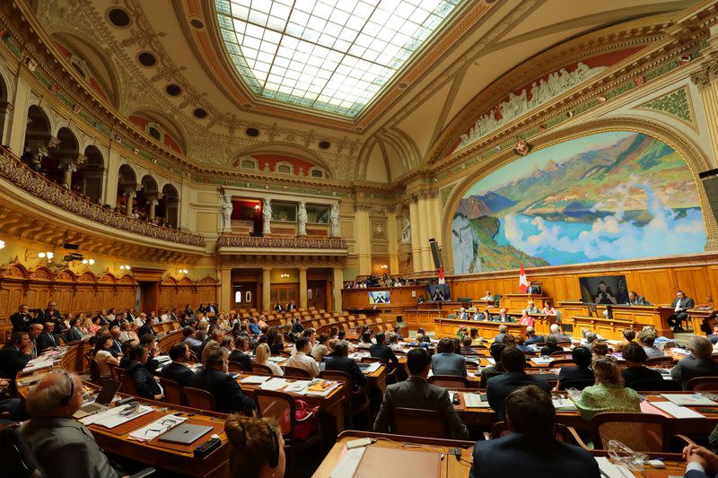 Ukraine's President Volodymyr Zelenskiy addresses Swiss Parliament via video message, in Bern