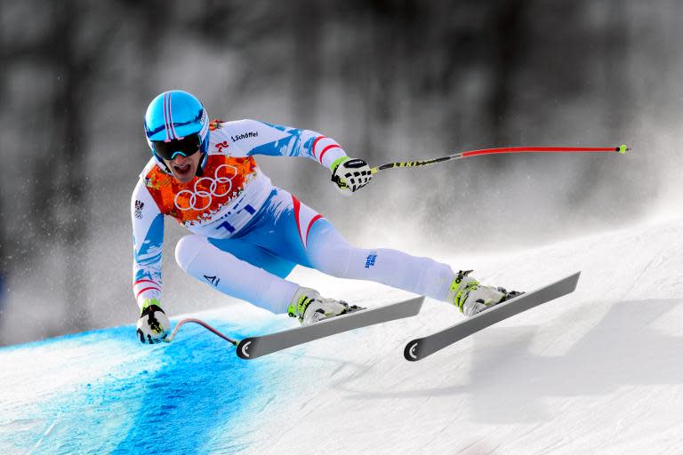 Austria's Matthias Mayer competes during the Men's Alpine Skiing Downhill at the Rosa Khutor Alpine Center during the Sochi Winter Olympics on February 9, 2014