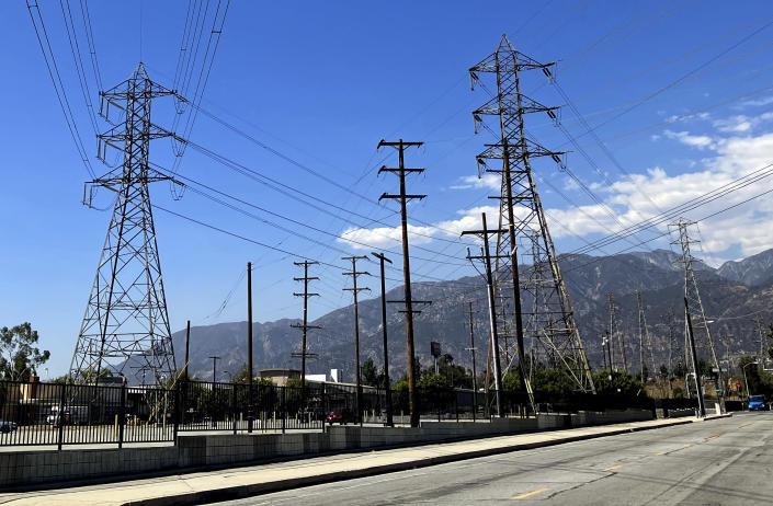 Electrical grid towers are seen during a heat wave where temperature reached 105 degrees Fahrenheit, in Pasadena, Calif. on Wednesday, Aug. 31, 2022. Operators of California’s power grid called for statewide voluntary conservation of electricity Wednesday as a heat wave spread over the West and they warned that there could be energy shortages if conditions worsen. (AP Photo/John Antczak)