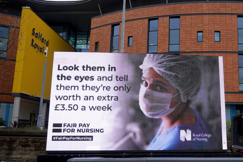 A billboard displays the Royal College of Nursing’s response to the government’s NHS pay proposal in March (Getty)