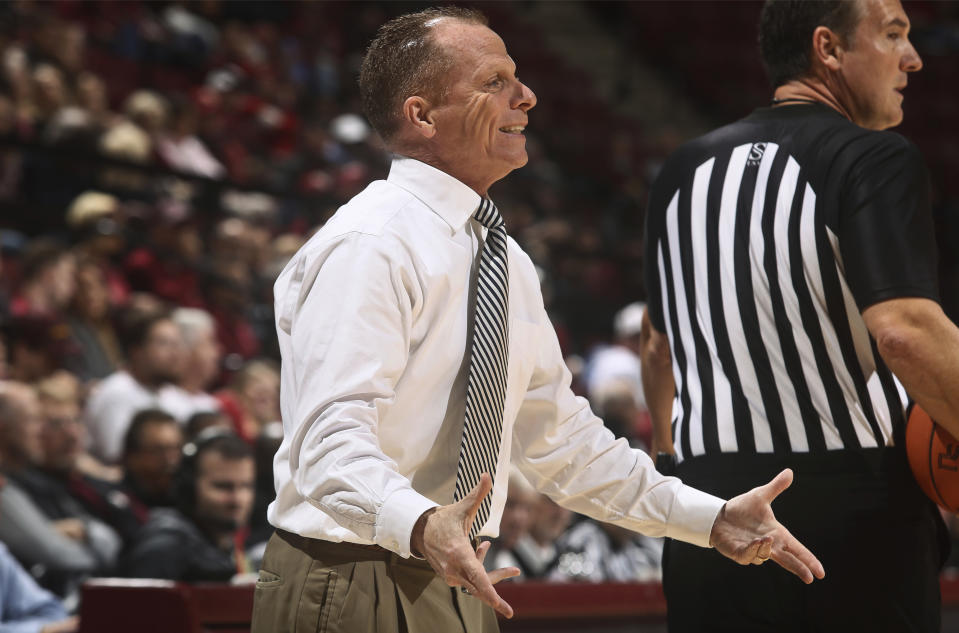 North Florida head coach Matthew Driscoll directs his team in the first half of an NCAA college basketball game against Florida State in Tallahassee, Fla., Tuesday, Dec. 17, 2019. (AP Photo/Phil Sears)