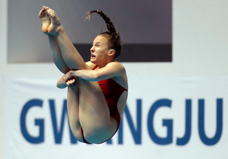 Germany's Lena Hentschel performs her routine in the women's 3m springboard diving event at the World Swimming Championships in Gwangju, South Korea, Thursday, July 18, 2019. (AP Photo/Lee Jin-man )