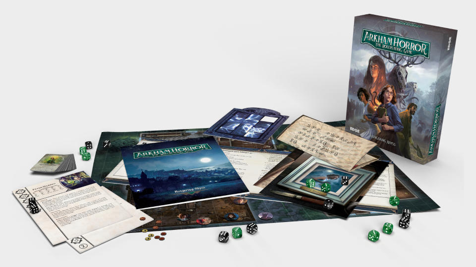 Arkham Horror The Roleplaying Game Starter Set laid out on a plain background