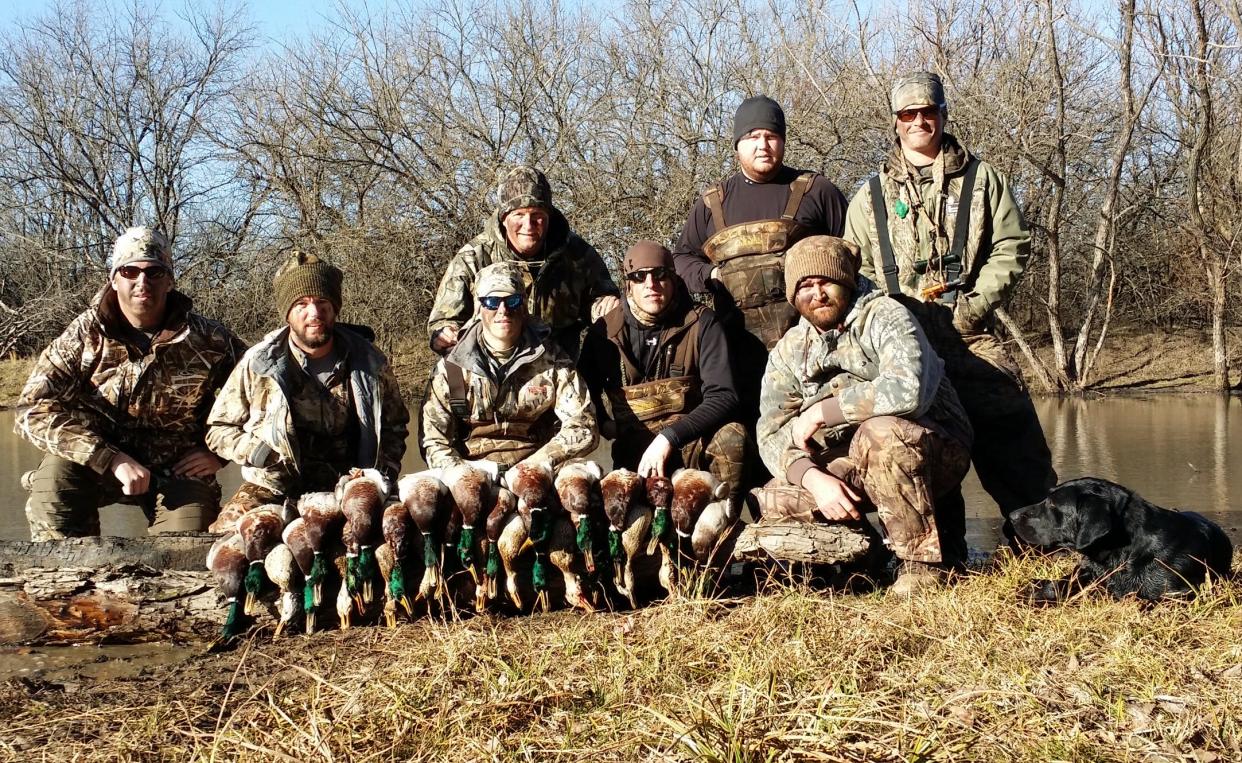 Duck hunting provides the opportunity to visit new places with friends, such as with this successful Kansas hunt.  COURTESY PHOTO