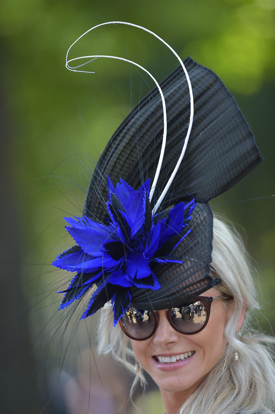 <p>A racegoer arrives at Ascot Racecourse for the Royal Ascot on June 20, 2017.<br> (BPI/Hugh Routledge/REX/Shutterstock) </p>