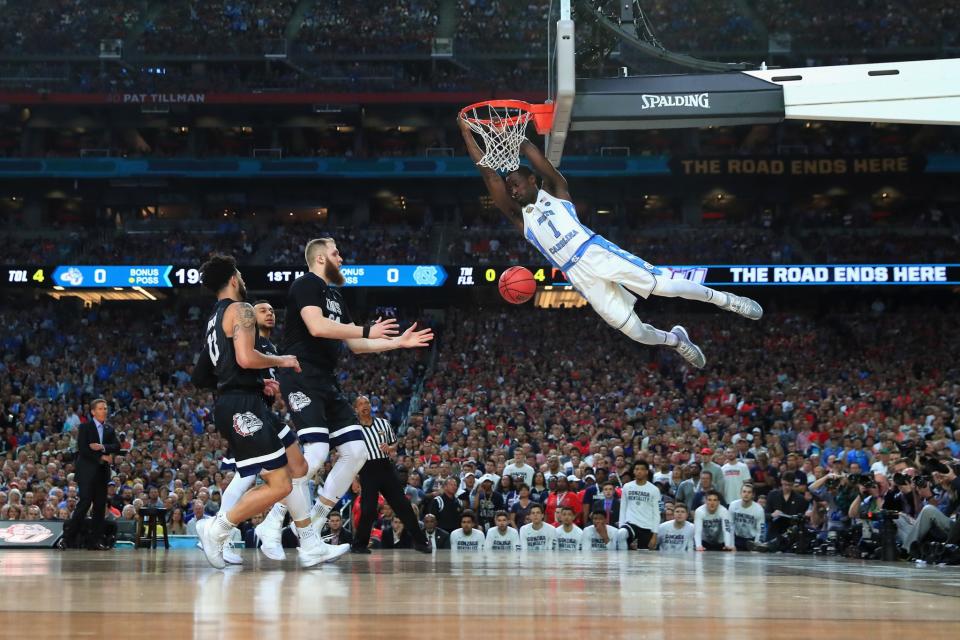 <p>Theo Pinson #1 of the North Carolina Tar Heels dunks in the first half against Przemek Karnowski #24 of the Gonzaga Bulldogs during the 2017 NCAA Men’s Final Four National Championship game at University of Phoenix Stadium on April 3, 2017 in Glendale, Arizona. (Photo by Tom Pennington/Getty Images) </p>