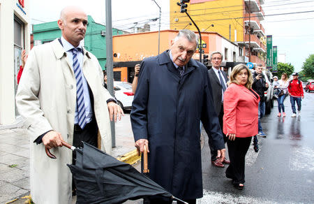 Former Ford Motor Co. security chief Hector Sibilla leaves the court after the trial in Buenos Aires, Argentina, December 11, 2018. REUTERS/Bernardino Avila