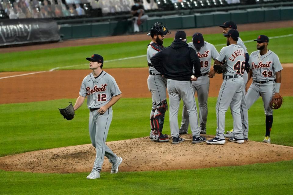 Detroit Tigers starting pitcher Casey Mize (12) heads to the dugout after manager Ron Gardenhire relieved him during the sixth inning of a baseball game against the Chicago White Sox, Friday, Sept. 11, 2020, in Chicago.