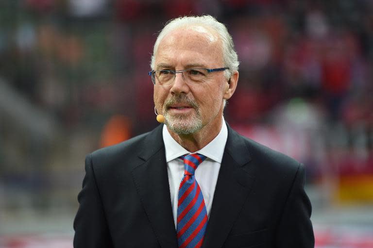 German football legend Franz Beckenbauer attends a football match at the Olympic Stadium in Berlin on May 17, 2014