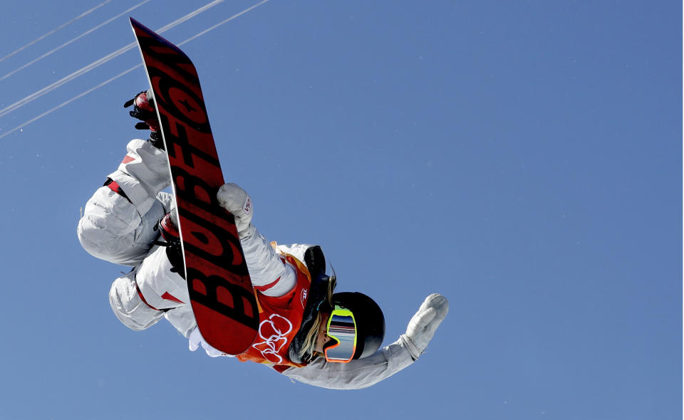 FILE - In this Feb. 13, 2018, file photo, Chloe Kim, of the United States, competes in the women's halfpipe finals at Phoenix Snow Park at the 2018 Winter Olympics in Pyeongchang, South Korea, Tuesday,. Heading to Princeton next fall, Kim is trading her board for books as she tries to blend in and become your normal college freshman. (AP Photo/Kin Cheung, FIle(