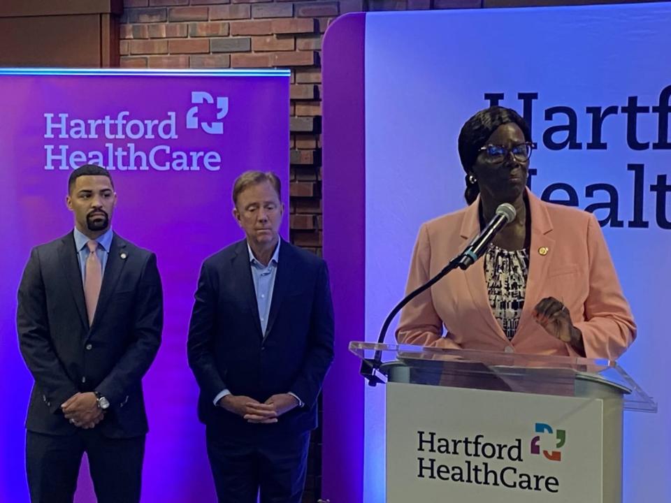 Sen. Patricia Billie Miller, D-Stamford, addressed the upcoming rollout of Connecticut's new baby bonds program, as Treasurer Erick Russell and Gov. Ned Lamont look on.