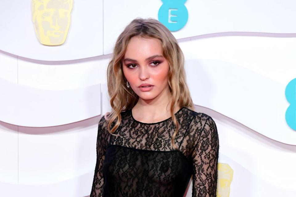 Lily-Rose Depp has spoken about the challenges of growing up with famous parents (Ian West/PA) (PA Archive)