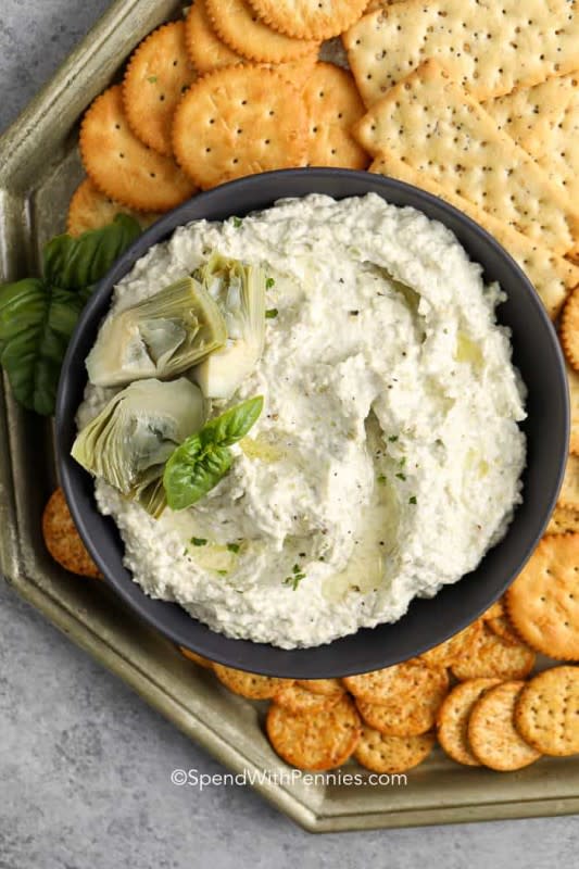 <p>Spend With Pennies</p><p>This five-minute dip is great when you need something totally last minute.</p><p><strong>Get the recipe: <a href="https://www.spendwithpennies.com/quick-creamy-artichoke-dip/" rel="nofollow noopener" target="_blank" data-ylk="slk:Creamy Artichoke Dip;elm:context_link;itc:0;sec:content-canvas" class="link rapid-noclick-resp">Creamy Artichoke Dip</a></strong></p>