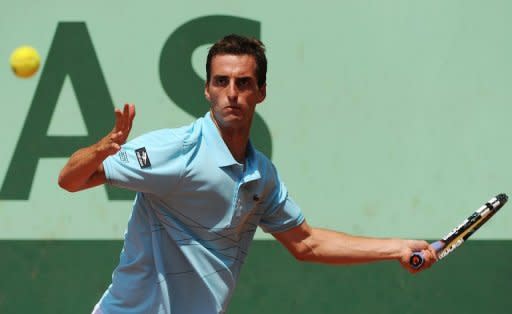 Spain's Albert Ramos during his French Open match against France's Benoit Paire on May 29. Ramos will face Roger Federer at the Wimbledon on Monday