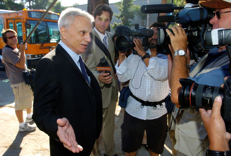 FILE PHOTO: Actor Robert Blake speaks to reporters as he walks to Burbank Courthouse in Burbank