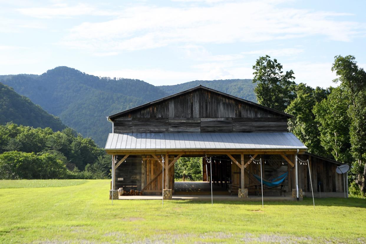 An old tobacco barn has been turned into an event space for weddings and more at Paint Rock Farm in Hot Springs. There is also a ping pong table in the barn for glamping guests. 