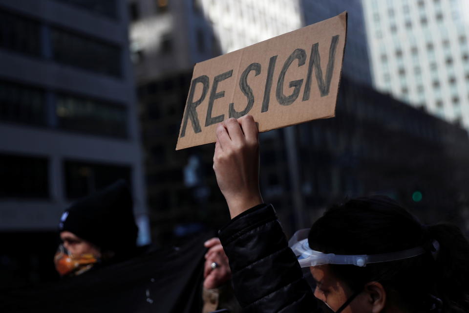 Demonstrators block 3rd avenue outside the New York Governor Andrew Cuomo's office calling for his resignation, in the Manhattan borough of New York, U.S. March 10, 2021. REUTERS/Shannon Stapleton