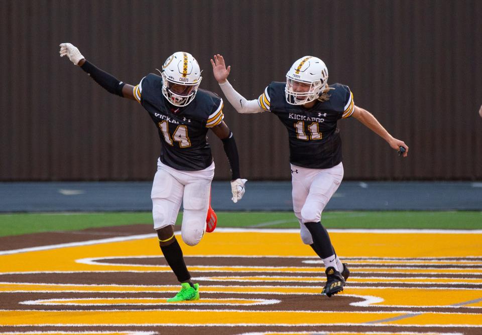 The Chiefs WR Shaun Campbell and QB Chase Hamme (11) celebrate a touchdown during Kickapoo’s game with the Camdenton Lakers at Kickapoo on September 2, 2022.