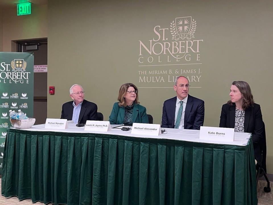 From left, Michael Marsden, Laurie Joyner, Michael Alexander and Kate Burns speak to the press about a new partnership between St. Norbert College and the University of Wisconsin-Green Bay April 11, 2024 in De Pere.