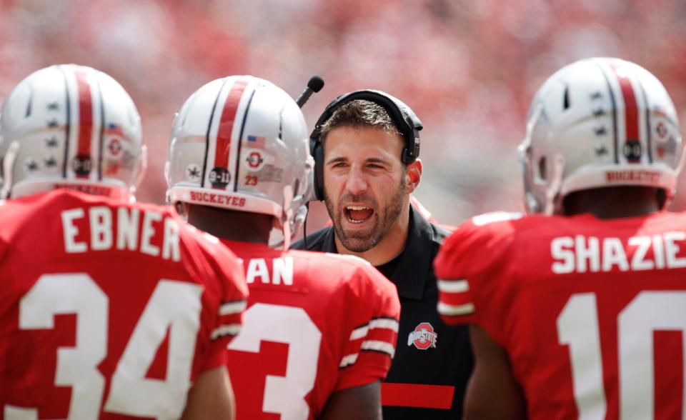 Ohio State assistant coach Mike Vrabel gives instructions during a break in a game between the Buckeyes and the University of Toledo at Ohio Stadium on Sept. 10, 2011.  (Fred Squillante/Columbus Dispatch)