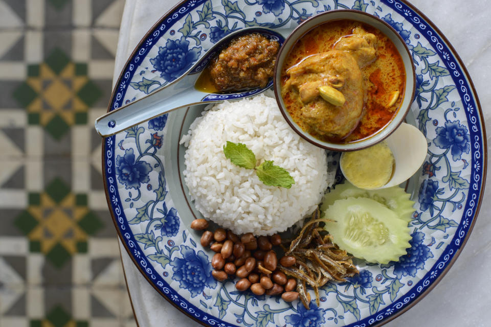 Malaysian Nasi Lemak on a beautiful plate.