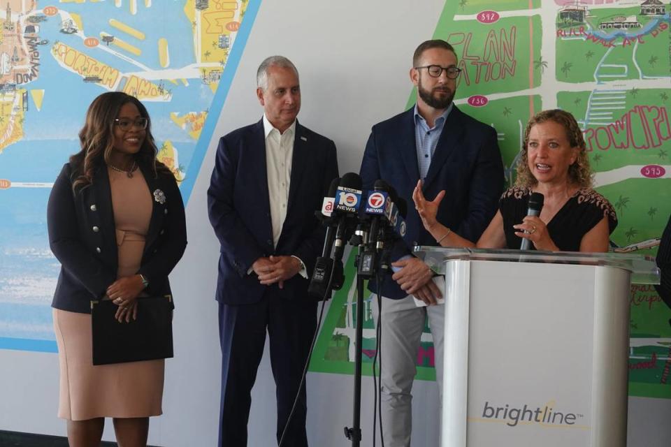 U.S. Rep. Debbie Wasserman Schultz, D-Fla., speaks during a news conference on new funding for railroad safety at the Brightline Train station in Fort Lauderdale on Monday, Aug. 15, 2022. Looking on are U.S Rep. Sheila Cherfilus-McCormick, D-Fla., U.S. Rep. Mario Diaz-Balart, R-Fla., and Brightline CEO Patrick Goddard.