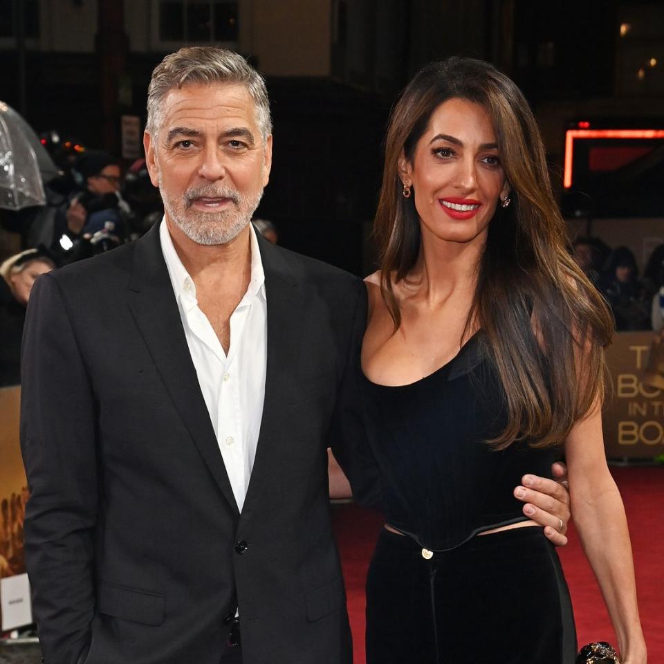 Amal Clooney's bold red lipstick proves that Cherry Girl is 2023's perfect party season look