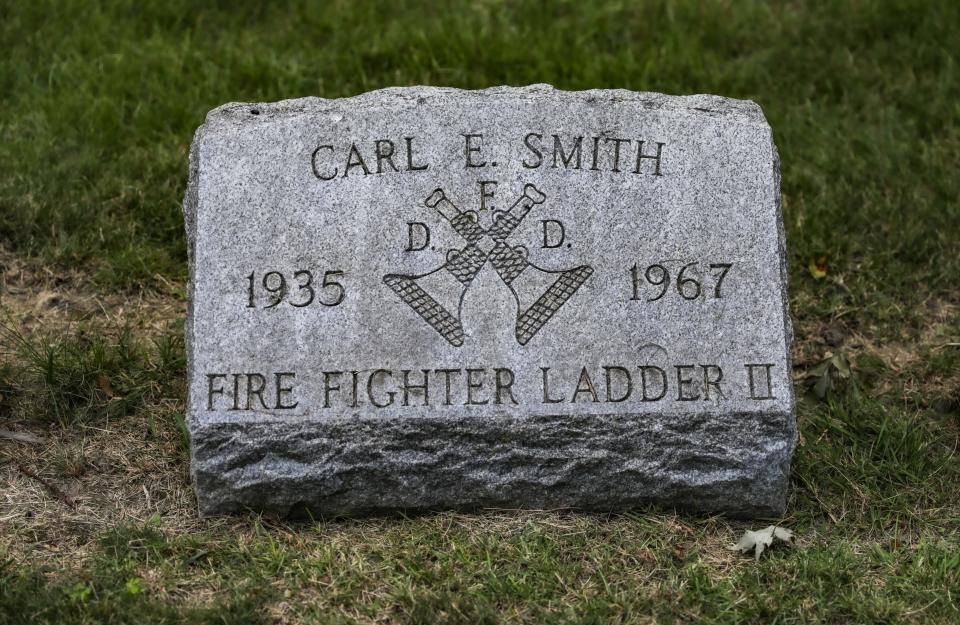 Firemen Carl Edward Smith is laid to rest at Elmwood Cemetery in Detroit, near the Detroit Fire Deptartment memorial on Wed. July 19, 2023. Smith died after being shot by a sniper while fighting fires during the unrest in Detroit in July 1967.