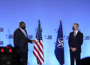 United States Defense Secretary Lloyd J. Austin III makes a statement during a meeting with NATO Secretary General Jens Stoltenberg at NATO headquarters in Brussels, Thursday, Oct. 21, 2021. NATO defense ministers gather for their fall meeting to assess the fallout of Moscow's closure of its mission to the alliance and an overall worsening of relations with Moscow. (AP Photo/Virginia Mayo, Pool)