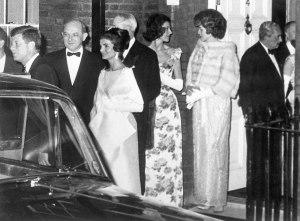 Guests, including John and Jackie Kennedy, leave Buckingham Palace