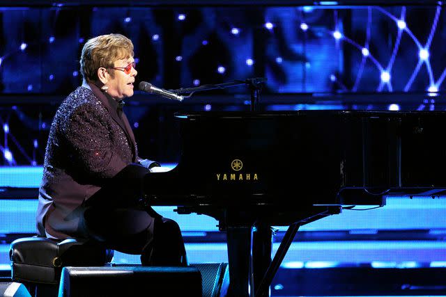 <p>Mike Coppola/WireImage</p> Elton John pictured at the 38th Annual Rock and Roll Hall Of Fame Induction Ceremony at Barclays Center in November 2023