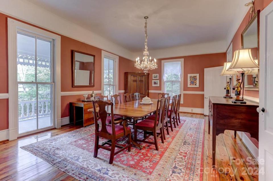The interior includes formal rooms for dining and entertaining.