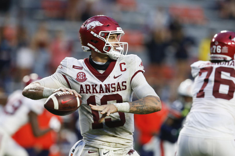 Arkansas quarterback Feleipe Franks looks for a receiver during the second half of the team's NCAA college football game against Auburn on Saturday, Oct. 10, 2020, in Auburn, Ala. (AP Photo/Butch Dill)