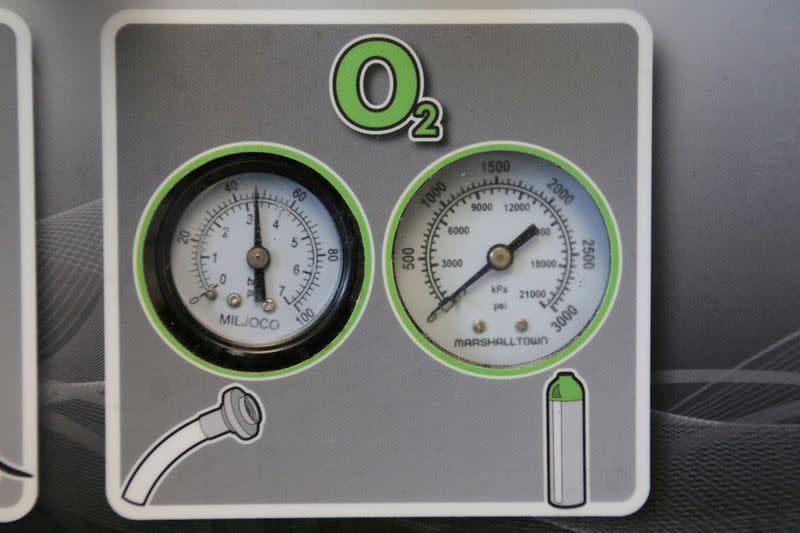 FILE PHOTO: Gauges to regulate oxygen on a ventilator are seen at a lab run by the University Health Network in Toronto