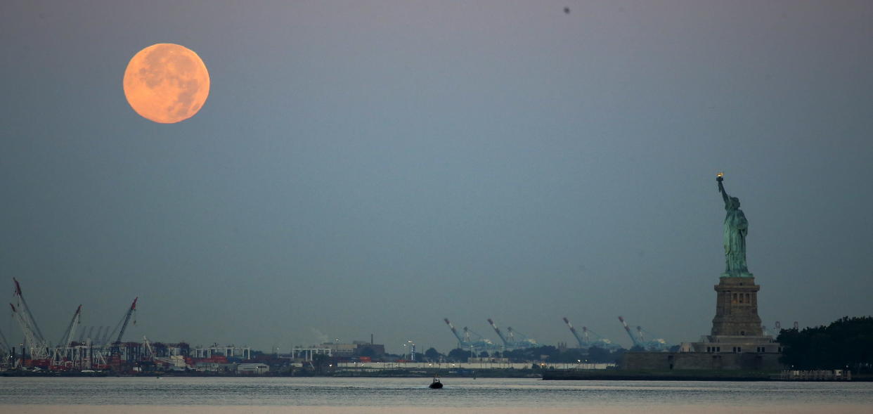 statue of liberty full moon