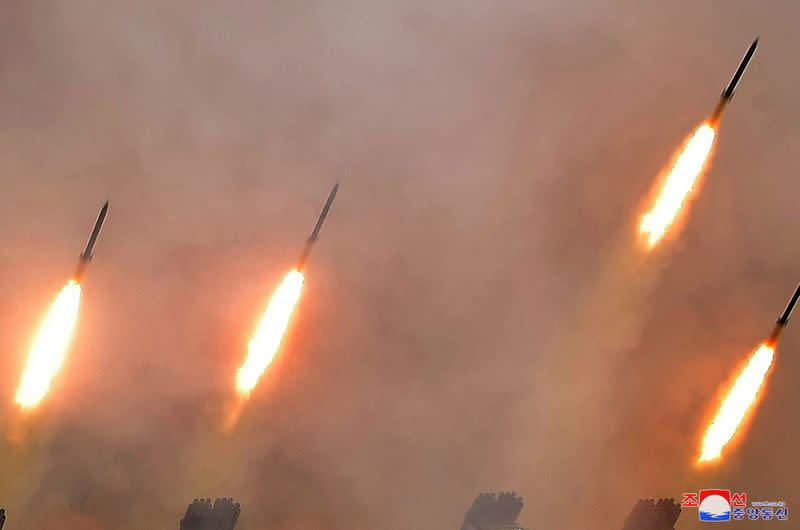 Missiles are seen as North Korean leader Kim Jong Un visits a drill of long-range artillery sub-units of the Korean People's Army