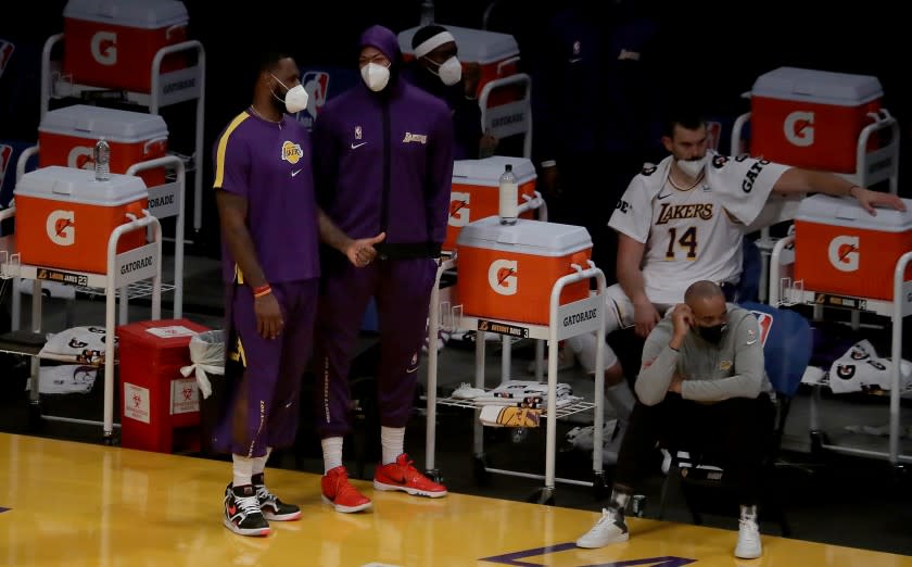 LOS ANGELES,, CALIF. - DEC. 13, 2020. Lakers superstars LeBron James and Anthony Davis sit out a presaason game against the Clippers at Staples Center on Sunday night, Dec. 13, 2020. (Luis Sinco/Los Angeles Times)