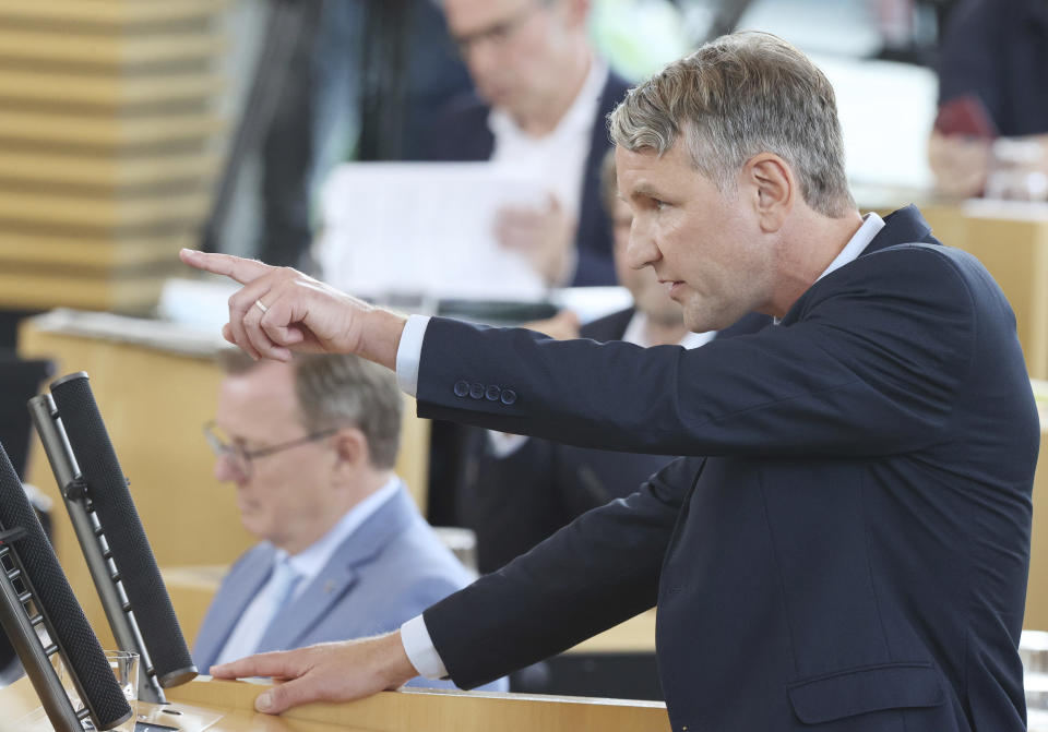 Bjoern Hoecke, parliamentary group leader of the AfD in the Thuringian state parliament, speaks before the vote in the plenary hall in Erfurt, Germany, July 23, 2021. The far-right Alternative for Germany party failed in an attempt Friday to unseat the left-wing governor of an eastern German state, a long-shot bid that opponents denounced as political theater. (Bodo Schackow/dpa via AP)