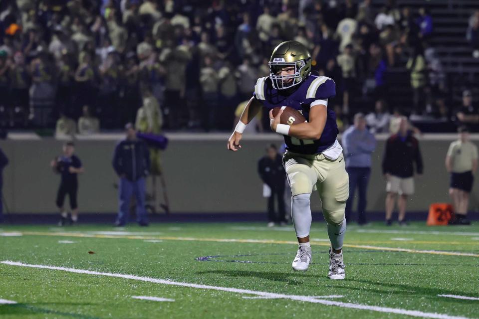 Salesianum quarterback Brady McBride (11) scrambles outside of the pocket during a regular season game between St. George’s and Salesianum Friday, Oct. 06, 2023, at Abessinio Stadium in Wilmington, DE.