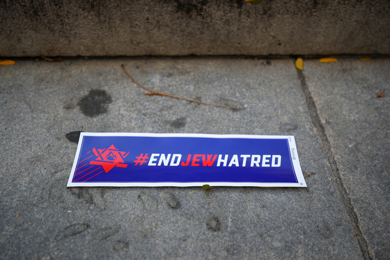 A sign at a protest in New York City reads End Jew Hatred.