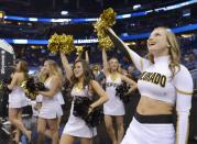 Colorado cheerleaders perform before the start of a second-round game in the NCAA college basketball tournament against Pittsburgh Thursday, March 20, 2014, in Orlando, Fla. (AP Photo/Phelan M. Ebenhack)